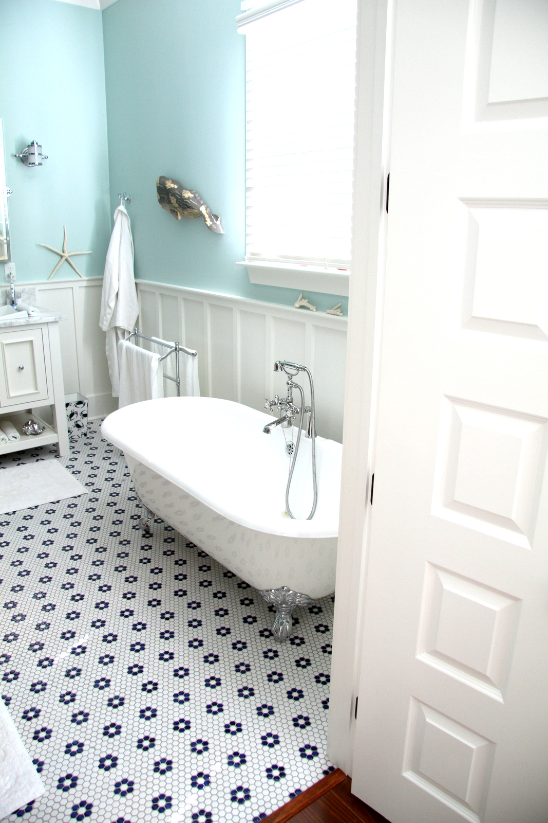 Floor tiles and clawfoot tubs are often used in our traditional Coastal homes from Thornhill Construction.